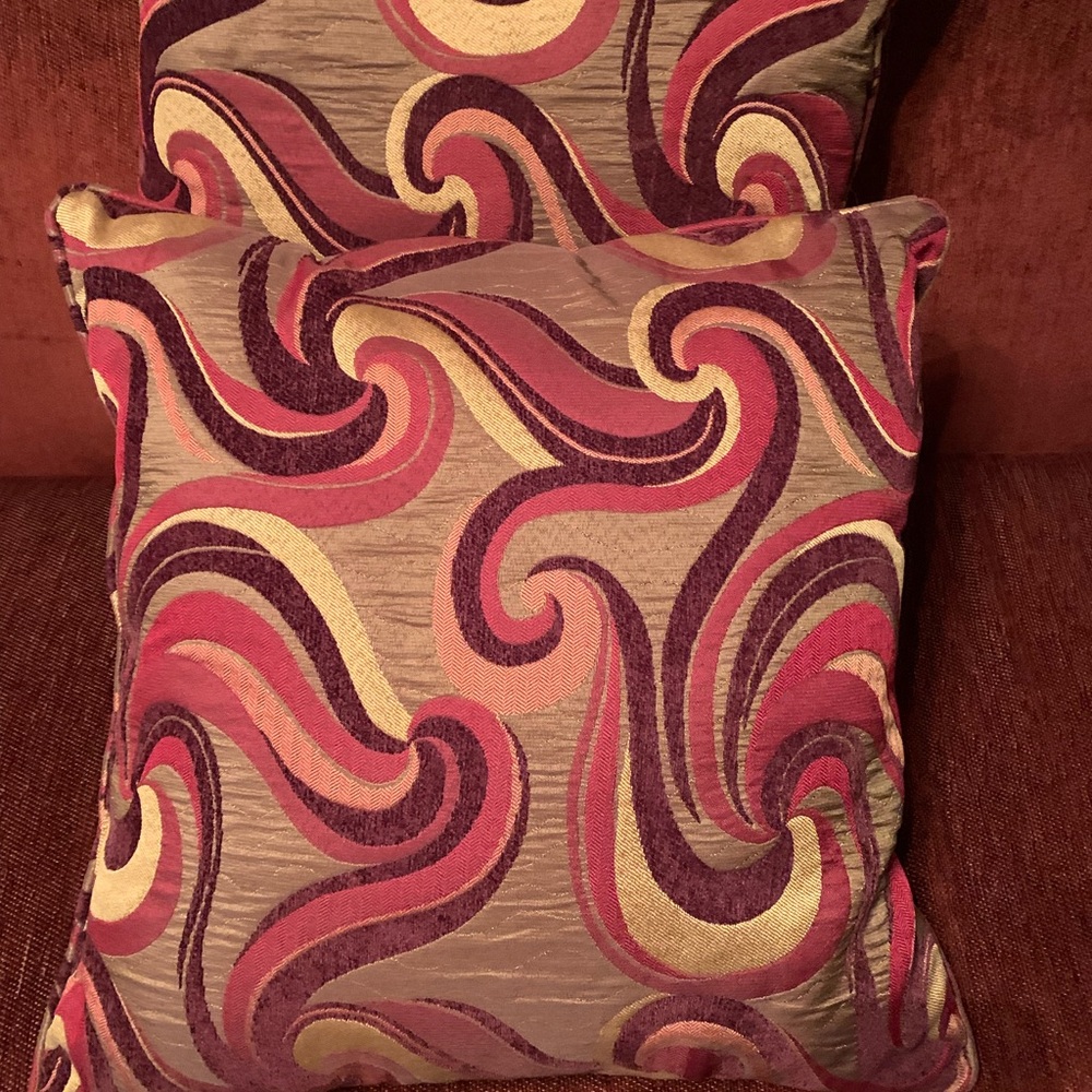 Schnadig set of 4 large pillows. Hues of Red, Brown & gold